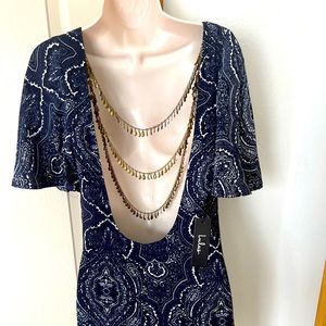 Lulu’s backless mini dress with chain